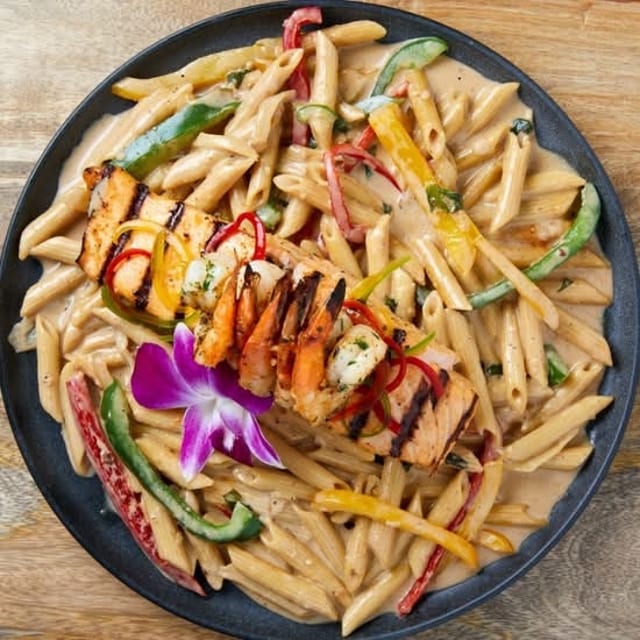 Rasta Pasta with Snapper Fillet & Shrimp.